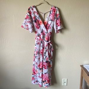 Bold floral v-neck tie jumpsuit